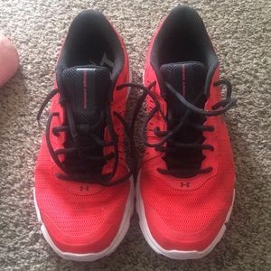 Orange under Armour running shoe